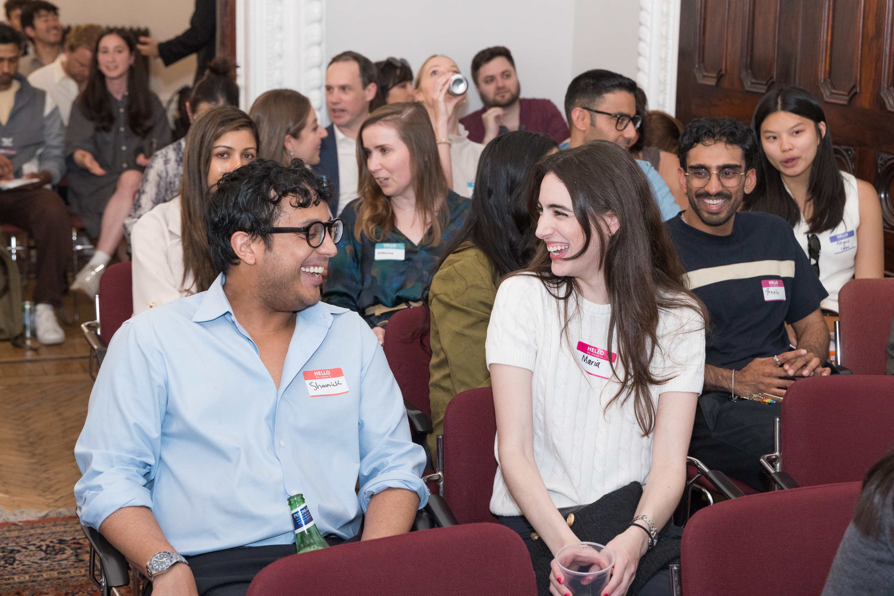 Attendees chatting at an NYAIGS event
