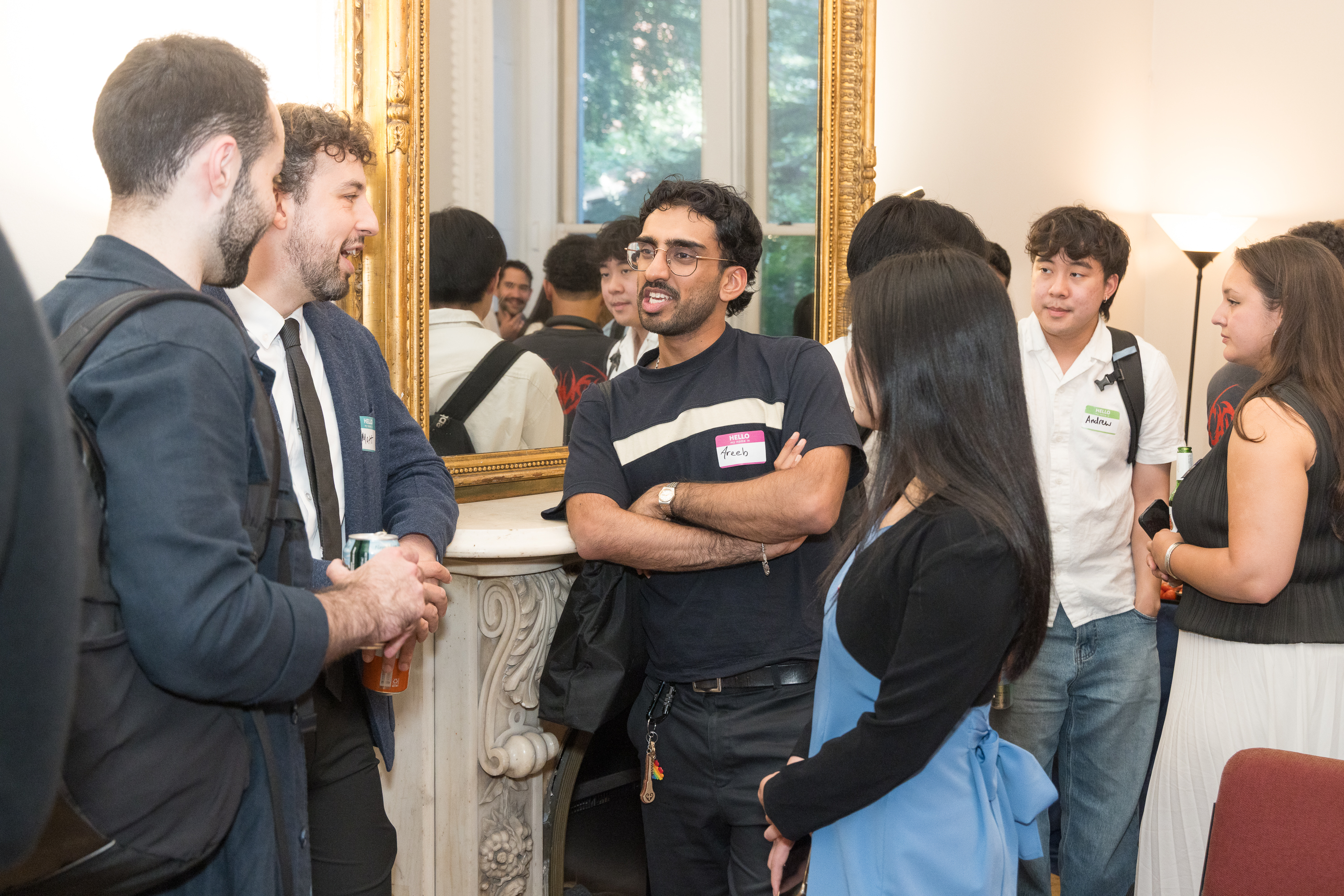 Guests networking at an NYAIGS gathering